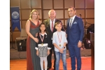 Nisa Üresin and Baki Cem Sirkecioğlu, the winners of the best picture and description award on waste and efficiency, were given their awards by DÖSİAD YKB Ms. Gültekin Gencer.